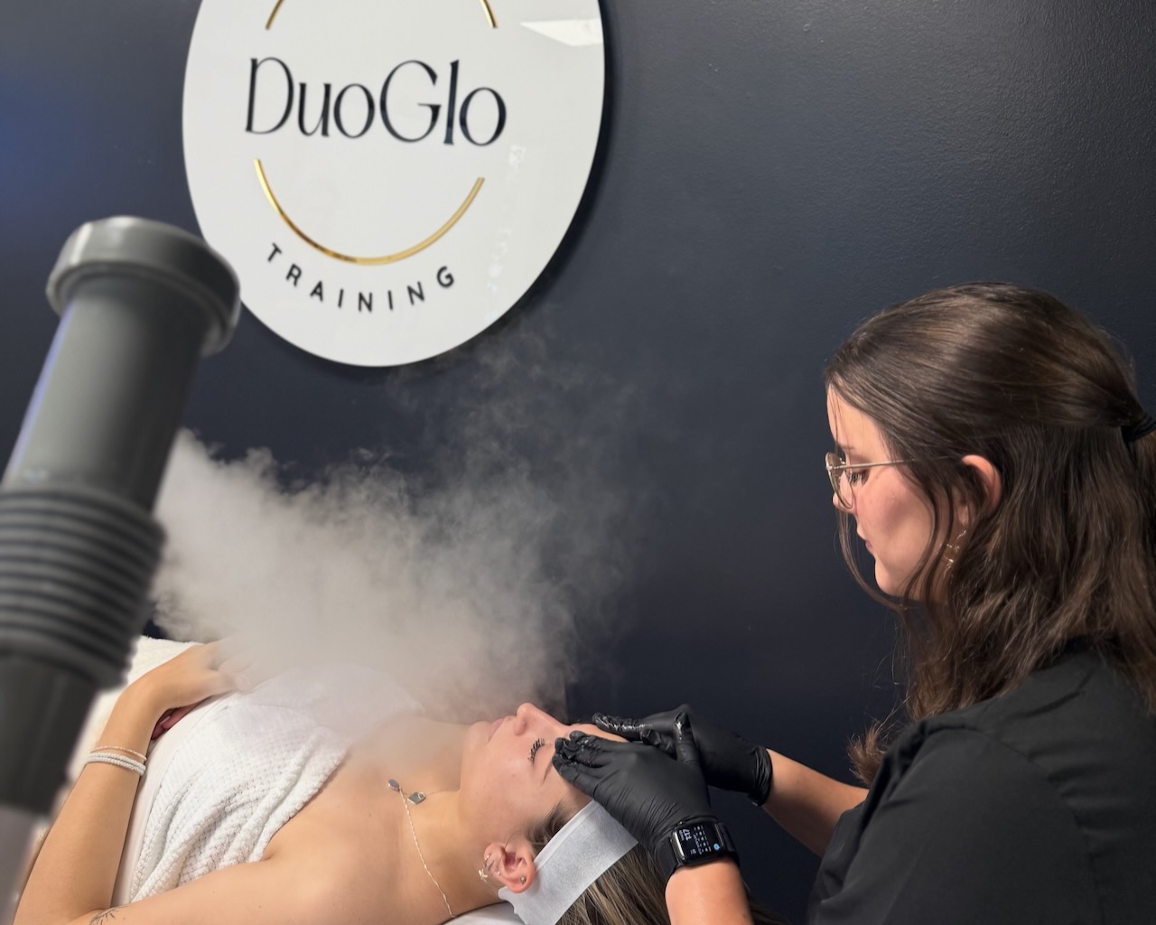 Beginner esthetics student performing extractions